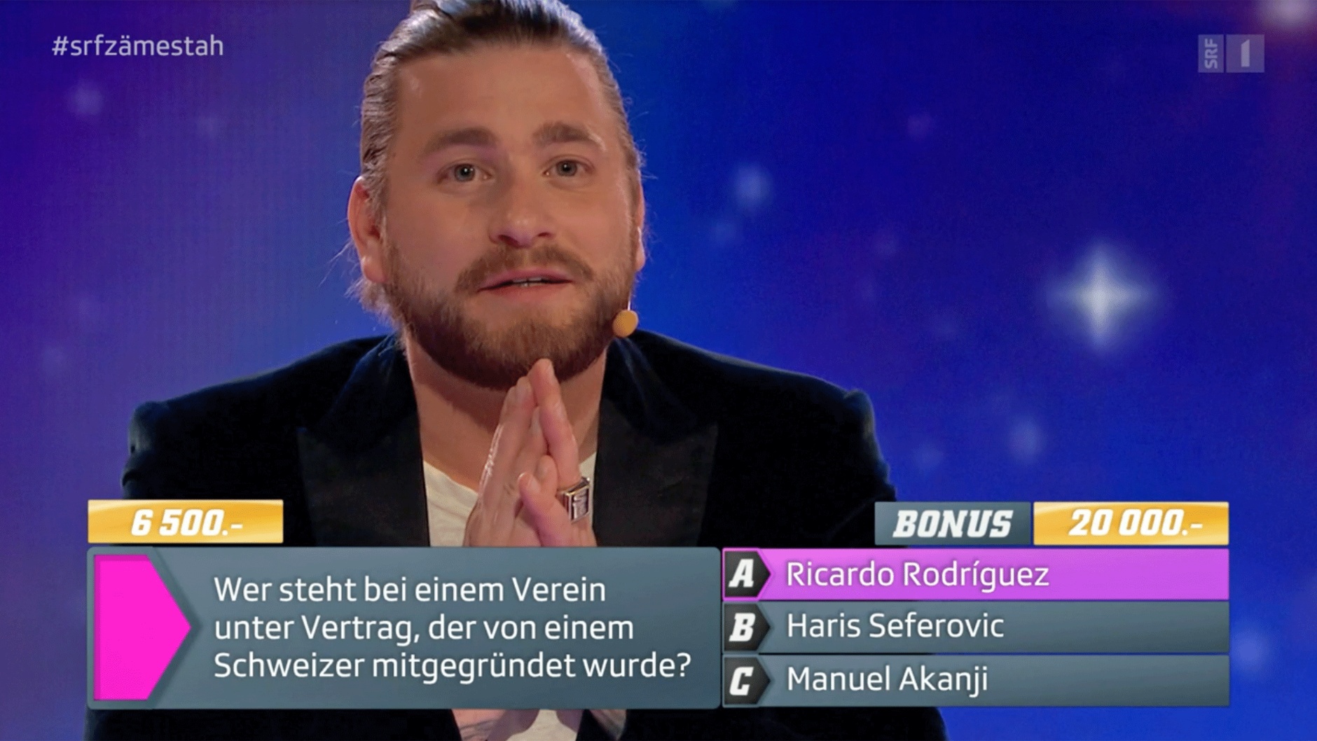 Baschi mit der Risikofrage bei «1 gegen 100» Spezial © SRF, Screenshot RFV Basel 2021